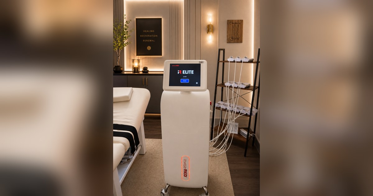 The InvisaRED iR Elite red light body contouring unit with its treatment pads, used for body contouring support
